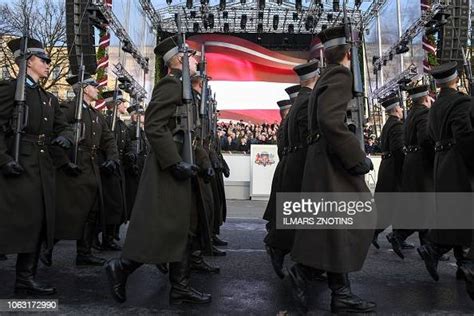 Latvian Soldiers Take Part In A Parade As The Baltic Country Marks