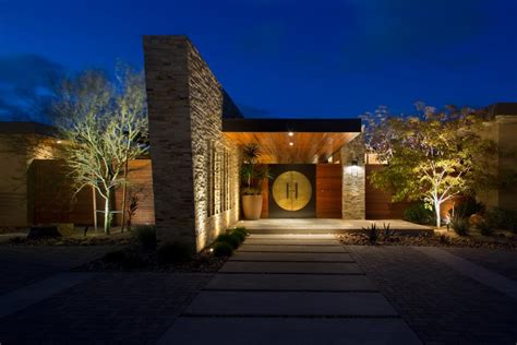 Modern Home With Cantilevered Entryway And Southwestern Landscaping