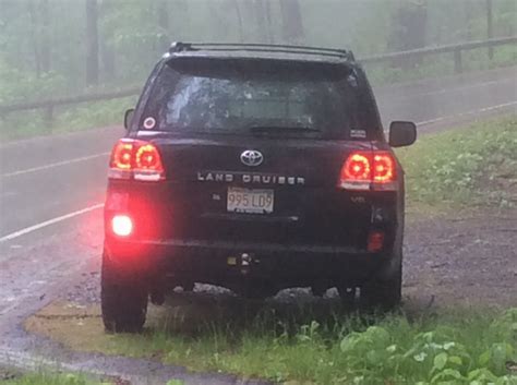 These are the fog light symbols you're looking for if you want to switch them on. Rear fog light pictures | IH8MUD Forum