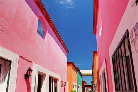 Colorful Buildings In Mexico By Adventure Photo
