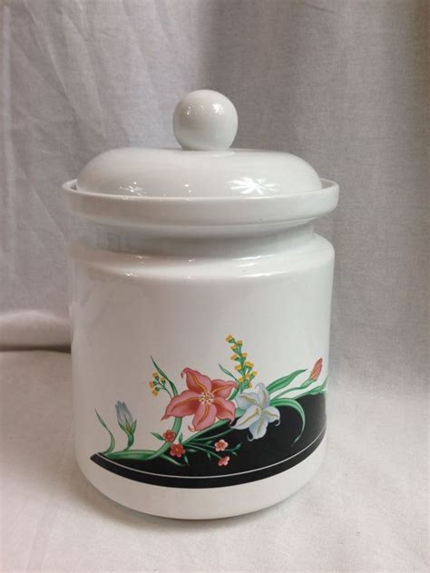 Also set sale alerts and shop exclusive offers only on shopstyle. White Ceramic Cookie Jar With Floral Design by ...