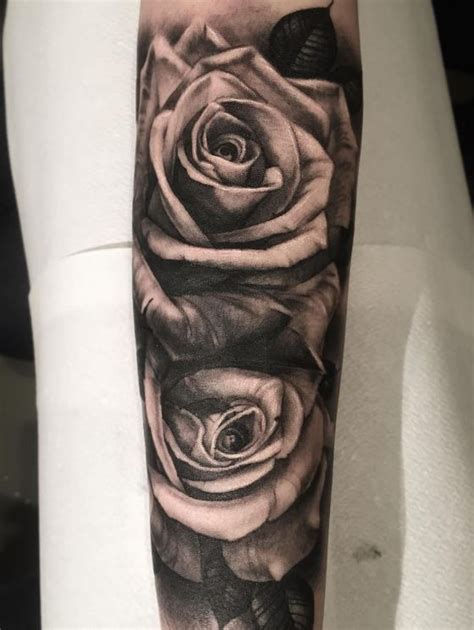 Rose tattoo on the elbow as the sleeve gapfiller. Black and Gray Roses Tattoo - InkStyleMag | Black and grey ...