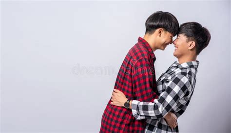 Two Men Who Love Each Other Happily Hug Each Other Stock Photo Image