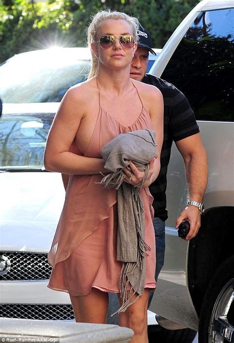 Bra Less Britney Spears Reveals Side Boob In Pink Halter Dress Daily