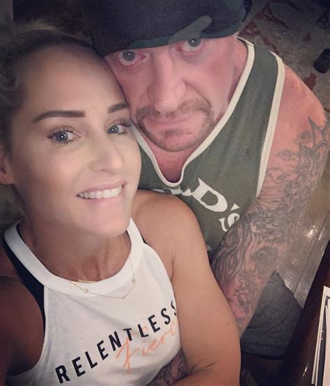 legendary wwe superstar the undertaker mark calaway with his wife retired wwe diva michelle