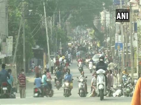 Karnataka today announced the lifting of weekend curfew starting next week as it treads cautiously even as daily covid cases continue to drop. Large number of people flock to grocery shops in Karnataka ...