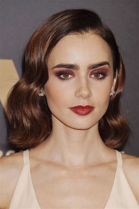 lily collins wavy dark brown all over highlights bob long bob hairstyle steal her style