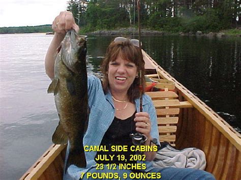 Imagine a small lakeside village, nestled in the woods, which has remained unchanged for generations. Fishing Grand Lake Stream, Maine - Canalside Cabins