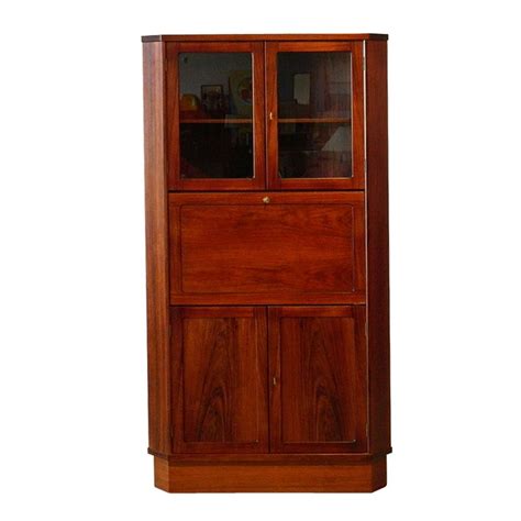Maybe you would like to learn more about one of these? Danish Rosewood Corner Cabinet with Drop Front Desk at 1stdibs