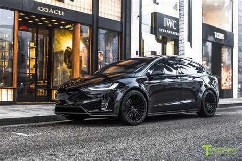 One of the best tesla model 3 accessories is a cooler custom. T Largo 7: Black and Orange Tesla Model X by T Sportline ...