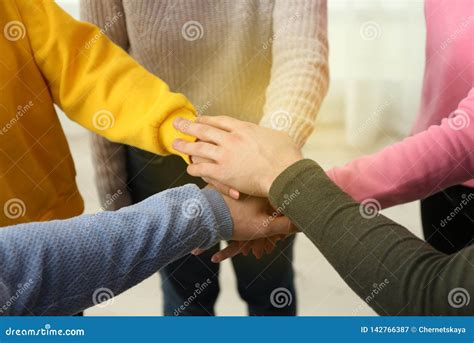 Group Of Volunteers Putting Their Hands Together Stock Image Image Of