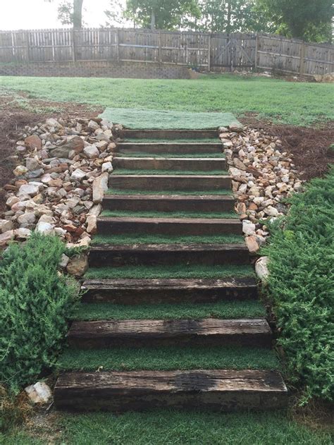 Various areas on the slope are flattened, with landscape timbers or railroad ties supporting the sides of the step. 43+ Best Railroad Ties Landscaping in 2020 | Outdoor ...