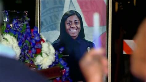 Vigil Honors Slain Arlington Police Officer