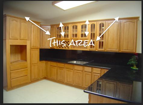 Remove cabinet doors and set aside. How To Cover Space Above Cabinets