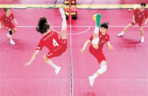 Watch the flexibility of the players. High-kicking women aim for sepak takraw gold