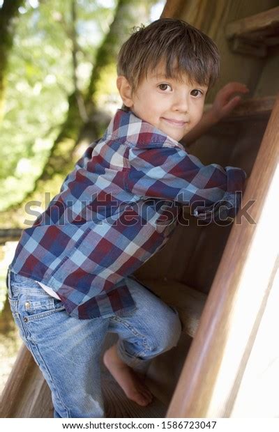 Young Boy Climbing Ladder Adventure Playground Stock Photo 1586723047