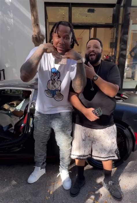 Moneybagg Yo Wearing A Cartoon Tee With Destroyed Jeans And Nike Af1s