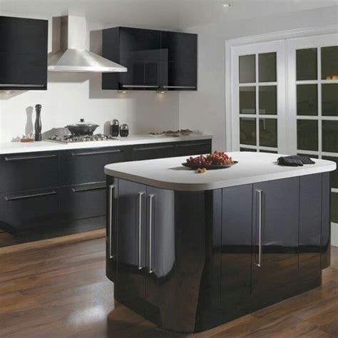 Charcoal grey gloss kitchen units white worktops and grey tiled. Charcoal cabinetry/white bench tops | Kitchen design ...