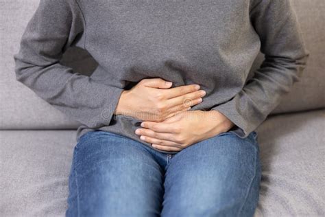 Woman Grab Her Stomach With Pain Suffer From Stomachache Or