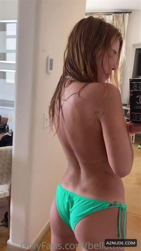 Bella Thorne Posing Topless In A Light Green Bikini Bottom For Her