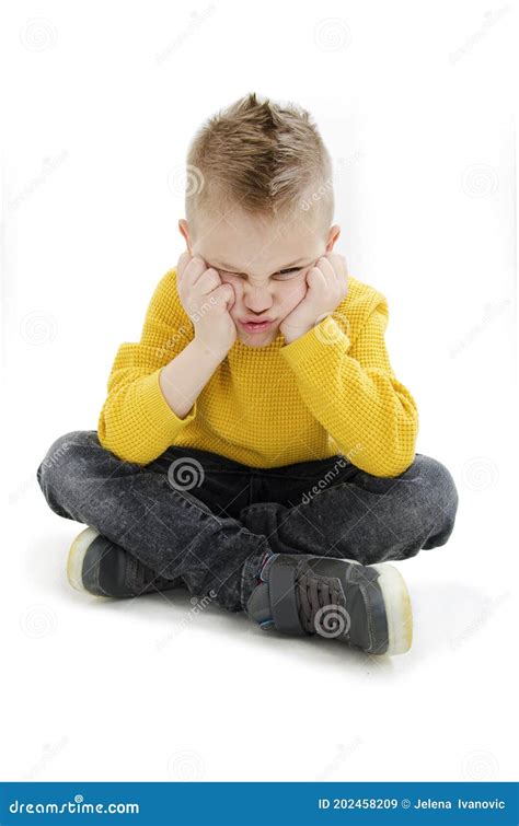 Sulky Angry Young Boy Child Sulking And Pouting Stock Image Image Of