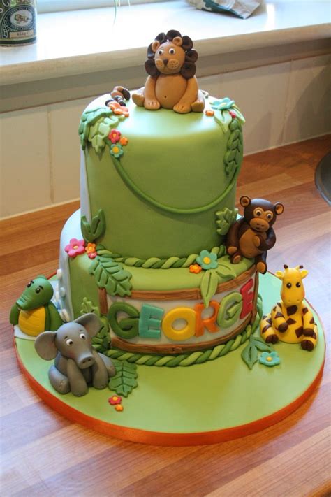 Celebrate baby's first birthday with a cake smash session from k.d. animal safari first birthday cake - Google Search | Safari birthday cakes, Jungle birthday cakes ...