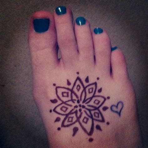 A lotus flower is one of the common henna designs since it implies purity, femininity, sensuality, grace, and creativity. Henna tattoo. Easy to do from home with a Henna Pen:) # ...