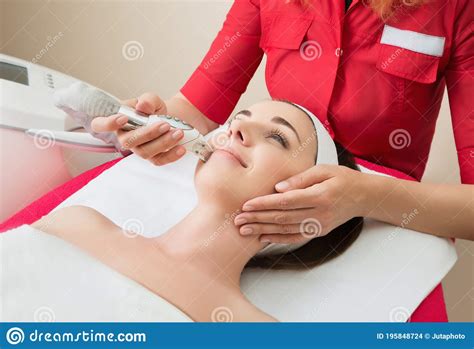 Rejuvenating Facial Treatment Model Getting Lifting Therapy Massage In