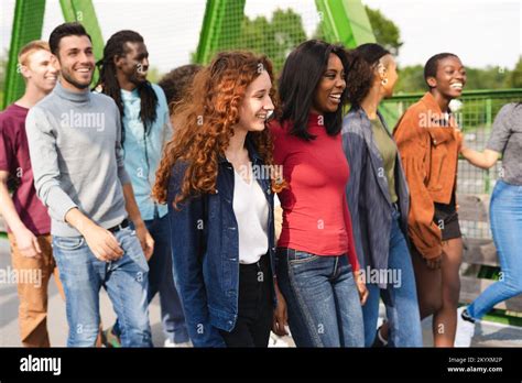 Group Of Multiracial People Having Fun Outdoor Laughing Together Stock