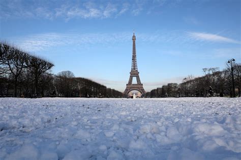 Snow And Freezing Rain In Paris Forces The Eiffel Tower To Close