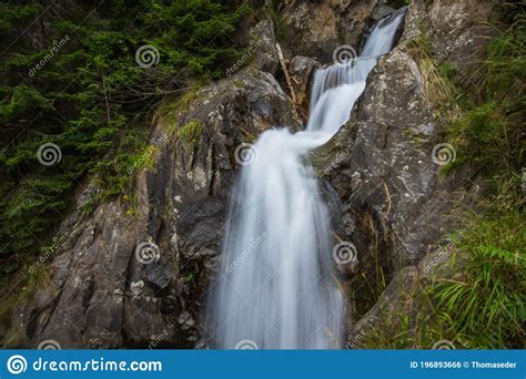 Small Waterfall Over Rocks In The Forest Stock Photo Image Of