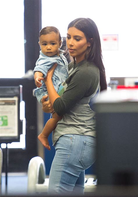 10 Cutest Pics Of Kim Kardashian Carrying North West [photos] Hot 107 9 Hot Spot Atl