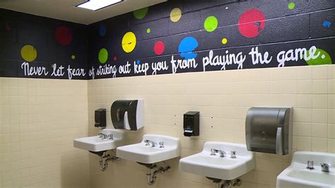 Parent Paints Messages On School Bathroom Walls To Inspire School