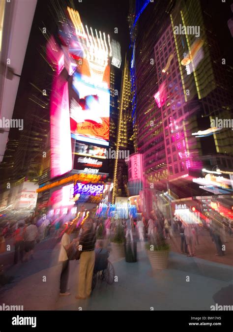 Neon Lights Of Times Square Exaggerated By Zooming Stock Photo Alamy