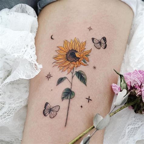 tatuagem de girassol no braço 50 inspirações que vão te encantar