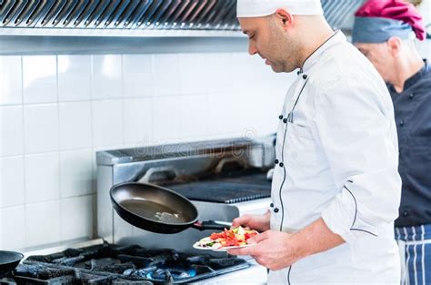 Chefs In Restaurant Kitchen Cooking Stock Image Image Of Hotel Chef