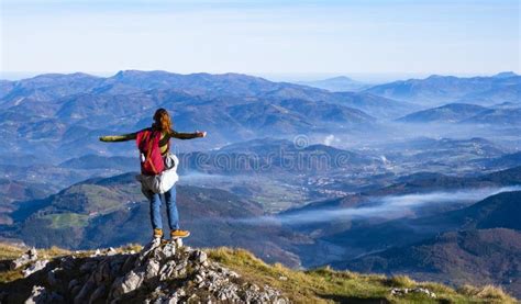 Hiker With Backpack Standing On Top Of The Mountain Stock Image Image