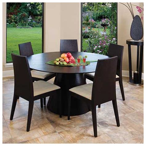 This table features a compact design ideal for smaller spaces, but it seats two to four comfortably. Contemporary and Modern Dining Tables: Wooden Round ...