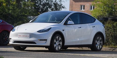 Tesla Launches Cheaper Model Y Adds 7 Seat Option