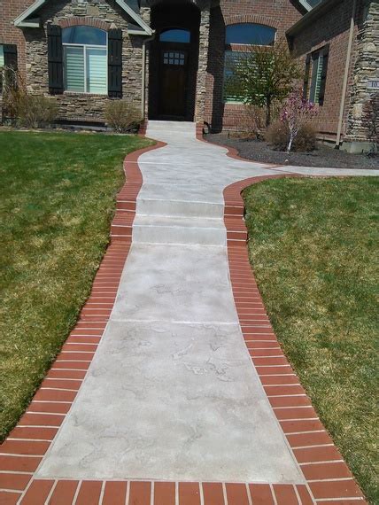 Brick border & grey tuscan walkway - Concretelocator.com ...