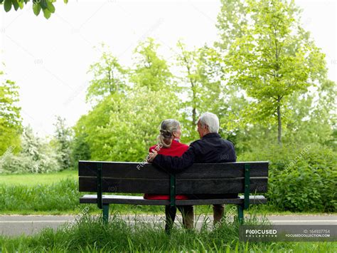 Elderly Couple On Bench
