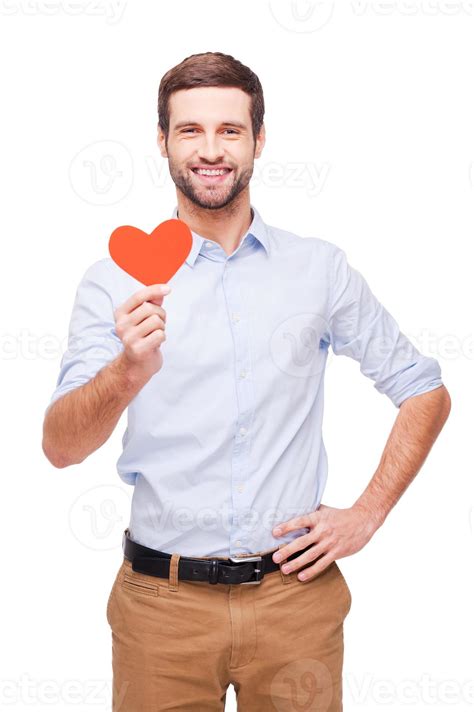 I Give You My Heart Handsome Young Man Holding Heart Shaped Valentine Card And Smiling While