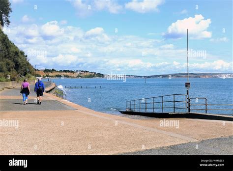 Shanklin Isle Of Wight Uk August 13 2019 Two Walkers Strolling The