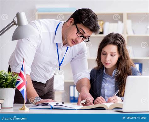 Teacher Explaining To Student At Language Training Stock Image Image