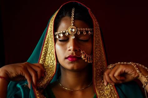 Premium Photo Portrait Indian Beautiful Female In Golden Rich