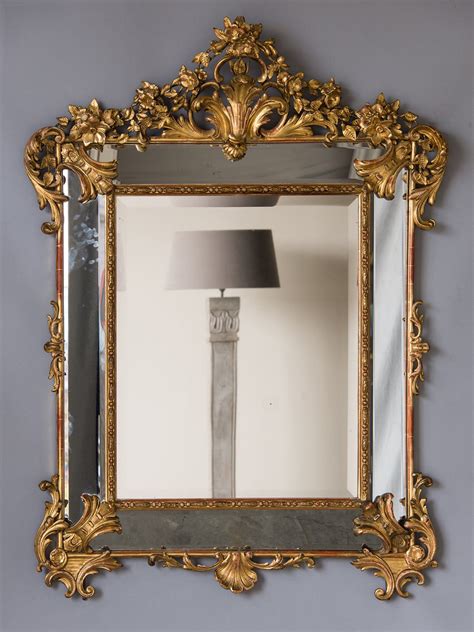 Three common types of mirror are the plane mirror, which has a flat, or plane, surface; Bold Antique French Régence Style Pareclose Gold Leaf ...