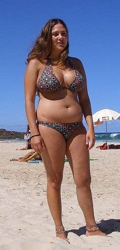 Stacked Curvy Busty Brunette Chubby Woman In Bikini At The Beach
