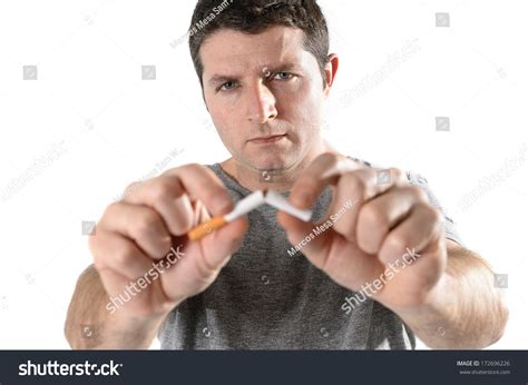 Young Attractive Man Breaking Cigarette Isolated Stock Photo 172696226