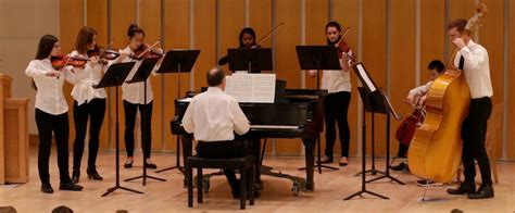 String Ensemble Performs At Upper School Assembly Micds