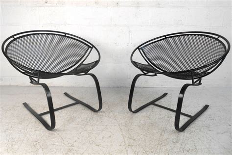 Rare 1960's medallion patio set. Pair Mid Century Modern Iron Cantilever Patio Chairs by ...